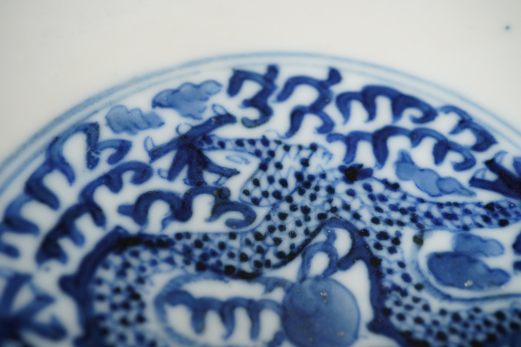 A Chinese blue and white ‘dragon’ stem bowl, Guangxu six character mark and of the period (1875-1908)